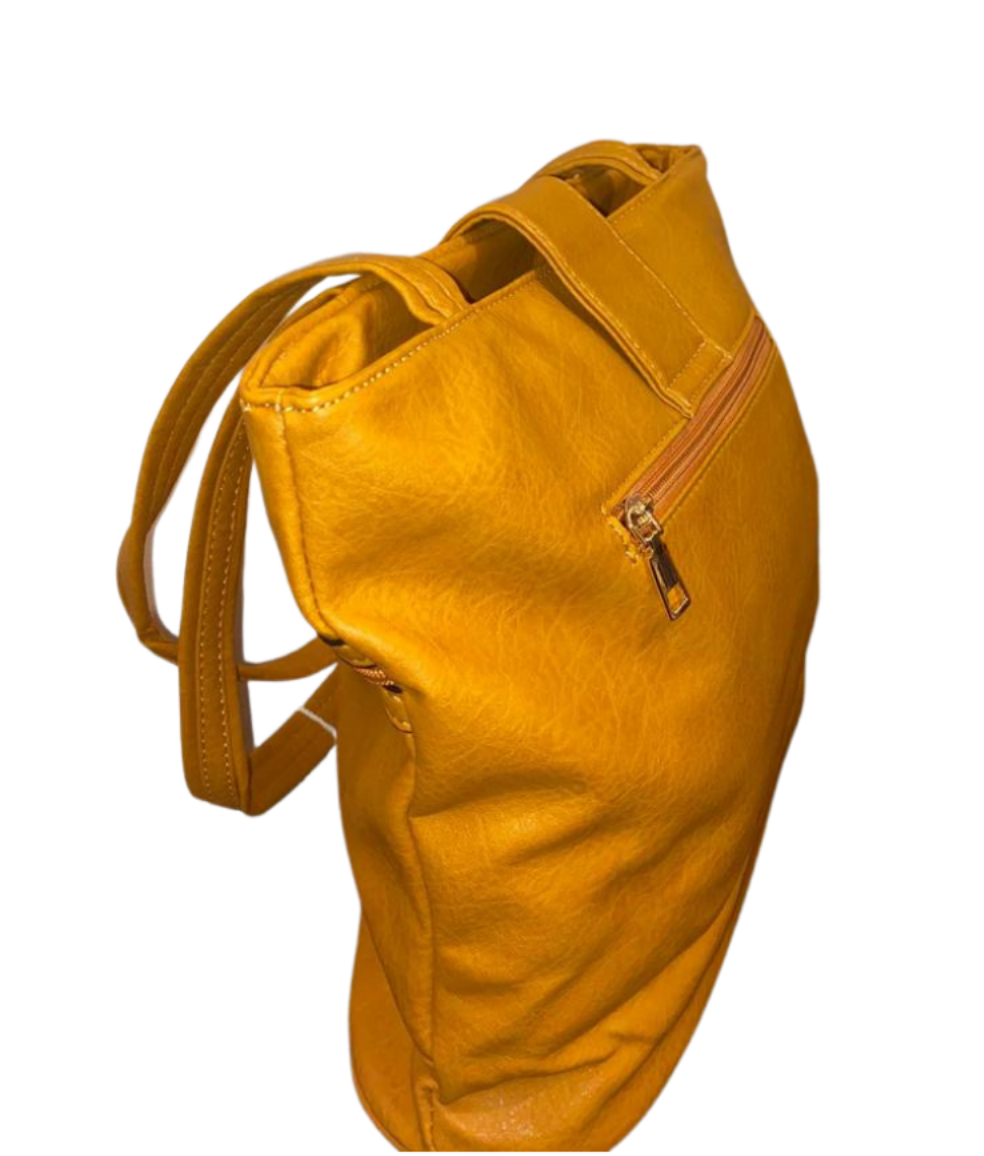 Tan Handbag with bow detail and double zips across the front.
